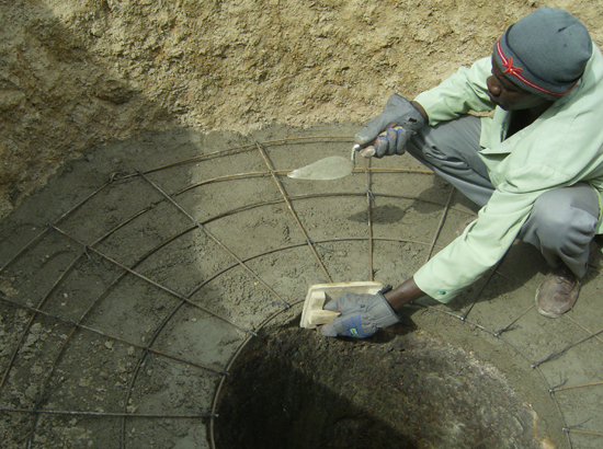 Placing the concrete fo the anchor